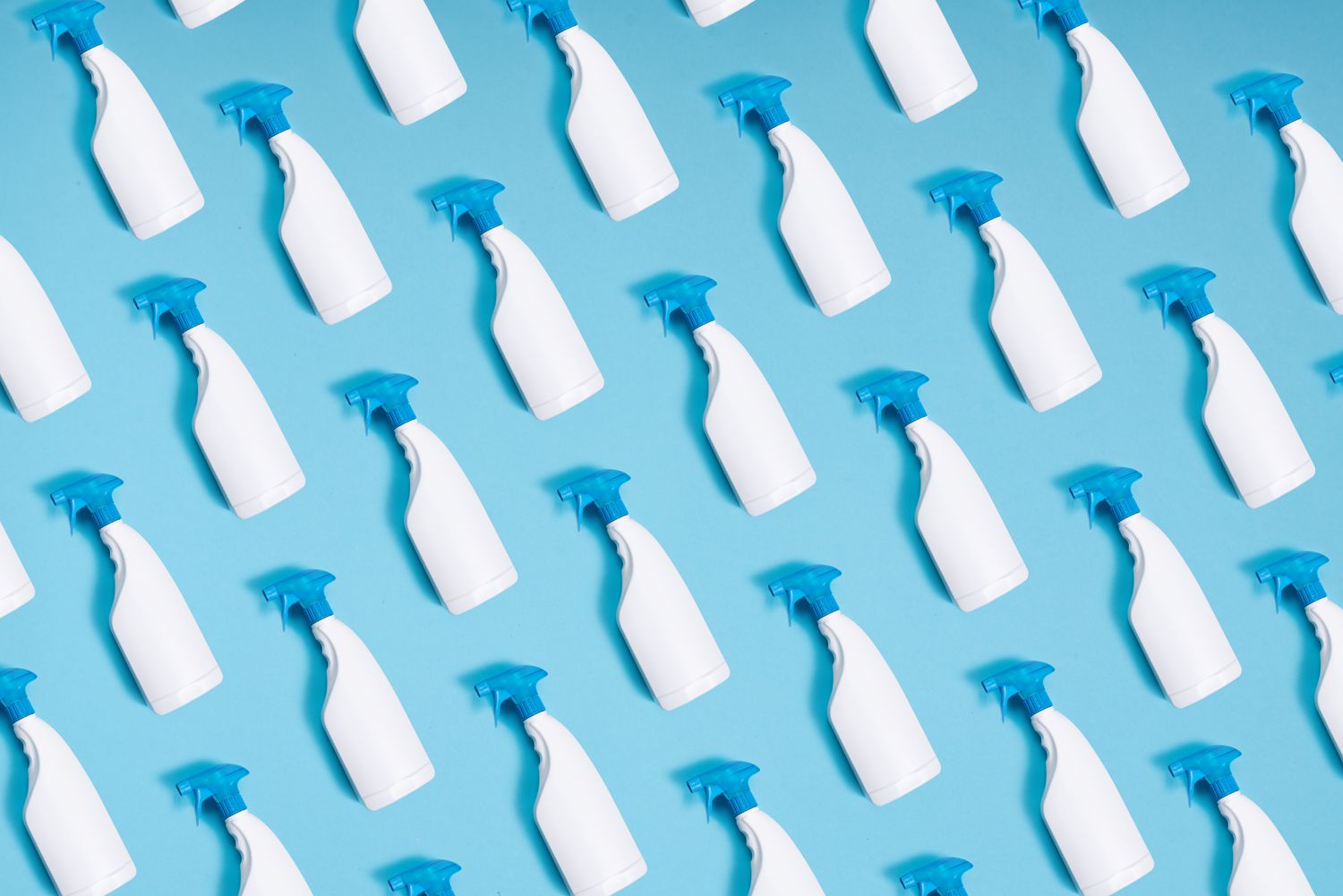 spray bottle pattern repeated on blue background