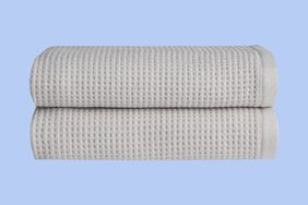 Collage of the Cozy Earth Hand Towel Set on a blue background